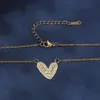 Kleine en frisse liefdeskraagketen Dames koper Micro ingelegde gekleurde zirkoon Hoogwaardige unieke dubbele hart veelzijdige ketting