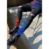 Mężczyźni luksusowe czarne odcinki chude dżinsy Wiercenie Wysokiej jakości designerskie spodnie Hip Hop Spodery uliczne dżinsowe spodnie Y2K 240428