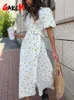 Abiti estivi casual da donna 100% in cotone stampa floreale abito midi a linea con fessure laterali lungo abito bianco elegante per donne 2024 240420