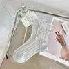 Chaussettes de femmes dames fashion transparente en verre maille de soie ultraHin en dentelle de cristal transparent chaussette de cheville élastique fabuleuse élastique