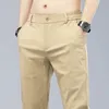 Primavera de algodão da primavera calças casuais Cintura elástica Empresa coreana Moda direta Classic Solid Color Troushers Black Khaki 240429