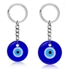 Keychains 12pcs Blue Evil Eyes Schlüsselbund Mode glückliche türkische Schlüsselring DIY -Autos Halter -Accessoires