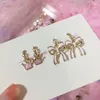 Brincos de costas 2 pares clipe de cor dourada de borboleta rosa para meninas moda moda esmalte a flor flor por atacado por atacado