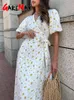 Abiti estivi casual da donna 100% in cotone stampa floreale abito midi a linea con fessure laterali lungo abito bianco elegante per donne 2024 240420