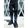 Mężczyźni luksusowe czarne odcinki chude dżinsy Wiercenie Wysokiej jakości designerskie spodnie Hip Hop Spodery uliczne dżinsowe spodnie Y2K 240428
