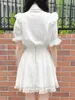 Blouses feminina de estilo japonês Rojita Lolita Camisa curta Minina de manga curta Mina de renda produzida em massa costura de bobina bowknot tops para mulheres