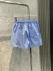 Suits-survêtements féminins 2024 Printemps / été Wear Blue Stripe Classic Classic Temperament Lace-Up Shirt and Shorts Suit 0420