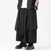 Мужские брюки Мужские асимметричные сплайс японская уличная одежда темно -черная мода свободна для обычной юбки для ног женщин плюс брюки размера