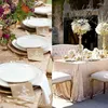 Свадебная вечеринка на столовой ткани свадебное блеск добавляет гламур, а центральная часть Sparkle создает идеальные ноты атмосферы.