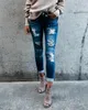 Dżinsowe dżinsy design kobiety niebieski przycisk Kolumbijskie chude podnośniki Buhigh talia dżinsowe spodnie