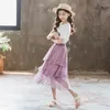 2024韓国の夏の子供の女の子2PCS服セットジュニアガールプリントTシャツキッズガールガーゼケーキスカートスクールジールスウィートスーツ240426