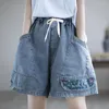 Jeans pour femmes Fashion haute broderie de broderie en jean pour les poches décontractées d'été femelles épissées pantalon de jambe large lâche Q837