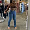 Kvinnors jeans sexig mager hög flexibilitet kvinnor midje knappfickor sida split blyertsbyxor casual streetwear daglig slitage