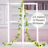 Dekorative Blumen künstliche gelbe Sonnenblume Girlande Blume Vine Hochzeitsfeier Blumenbogen Dekor Seide