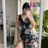 Casual jurken vakantiestijl sexy diepe v-neck bloemen print zwarte slanke jurk mouwloze retro elegante vrouwelijke chiffon vest lang