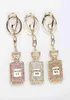 Keychains Fashion Creative Rhingestone Keychain Perfume bouteille de bouteille de clés de sac de voiture féminine PENSANT PENDANT CADEAU ANNIVERSAIRE T2209093648851