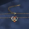 Kleine en frisse liefdeskraagketen Dames koper Micro ingelegde gekleurde zirkoon Hoogwaardige unieke dubbele hart veelzijdige ketting