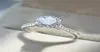 Enkel mode unika smycken real 925 sterling silver runda klippt vita topas cz diamant ädelstenar kvinnor bröllop brudring för lo4685073