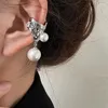 Backs oorbellen Hiphop Punk Vintage Pearl Zirkon Ear Moordwerks Niet -geperforeerde clip Fake kraakbeen oorbel voor vrouwen die sieraden verkopen