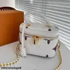 Louls Vutt 7 Color Women Designer Make -uptas 19cm Macaron reliëf embleem Crossbody schoudertas luxe handtas vintage zipper munt pur afvp