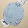 Women's Blouses Shiny Pocket Lapel Shirt European And American Style Loose Temperament Monochromatic Top Spring 2024
