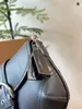 Luxo Bolsa de Hobo Bag clássica de bolsa de ombro feminina Bolsa de moda de moda Saco de ervilha uma bolsa versátil que pode acomodar facilmente cosméticos de telefone celular