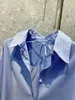 Suits-survêtements féminins 2024 Printemps / été Wear Blue Stripe Classic Classic Temperament Lace-Up Shirt and Shorts Suit 0420