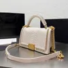 Louls Vutt Ladies Fap Mini Sacs de créateurs à bandoulière Couleur solide en cuir authentique Classic Handbags Gold-Tone Metal Chains Snake Patter Po Osqo