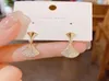 Brincos de garanhão S925 Designer de agulha de prata Earings de saia pequena 14K Luz de luxo de luxo de ouro