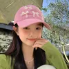 Bollmössor ins söta rosa båge kvinnors hattar 2024 vår och sommar reser koreansk version mångsidig solskyddsmedel baseball för män