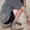 同じサンクシスタイルのボーンシューズ女性の2024年の夏の新しいアウトウェアフィッシングボーケンバオトーハーフスリッパ下着のための厚い靴底
