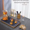 Ensembles de voies de thé 1 ensemble de théâtre en verre thermique paresseux kungfu thé à gouttes semi-automatiques avec une base de fer fleurissant du bureau d'infuseur