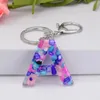 Keychains Colorful Stone Resin Epoxy Keychain 26 Lettre anglaise Pendant Europe et bijourie américain Créatif Créatif Gift