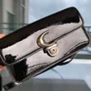 Counter High Quality Luxury Explosive Shoulder Fashion Bag Genuine Leather Womens for Early Spring New Studio Wine God High-end Feeling Stick Mini Patent bag