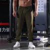 Pantaloni maschili sportivi in cotone primavera e guardia autunnale Casual Solid Color Plus Fat size Jogger uomini