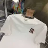 T-shirt a maniche corte maglietta femminile da donna la lettera di moda top di moda sciolta