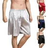 Pantalon pour hommes shorts hommes lisses minces massiques à la taille élastique à la maison porter la longueur du genou d'été endormi ajusté à mi-hauteur