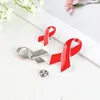 Broches VIH SIDA Scensivité