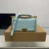 Louls vutt مصمم أزياء Advanced Quality Womens Classic Mom Phimon Leather Material Diamond Plaid Plaid Flip Bag Bag Bag Bag اوبكسه