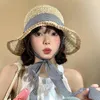 ワイドブリム帽子女性麦わら帽子夏日韓国スタイルの帽子柄ストラップレディーストラベルビーチフラットパナマキャップ屋外UV保護