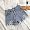 Jeans féminins short occasionnel à taille haute déchirée avec des poches trous de franges d'été