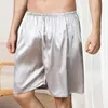 Pantalon pour hommes shorts hommes lisses minces massiques à la taille élastique à la maison porter la longueur du genou d'été endormi ajusté à mi-hauteur