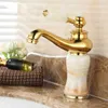 Torneiras de pia do banheiro Bacia de torneira europeia Bacia fria e quente Hot Jade Marble Basin Faucet All Copper Gold Washbasin Torneira