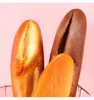 Fiori decorativi simulazione del pane artificiale PU Baguette morbida MOCCHIO FINOVO CASSE CAMPA PROPRIETÀ MODELLO DEIGLIO DEI PROPRIETÀ PROPPETTI PROPOSI