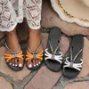 Pantofole 2024 sandali di tacco piatto da donna estivo da donna bling strass band stretto spiaggia casual zapatillas mujer