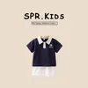 Vêtements Ensembles d'été jeunes enfants garçons 2pcs ensembles de vêtements de vêtements de dessin animé Polo imprimé solide