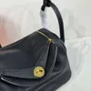Sac à main le sac à main amélioré Sac de cosmétique de marque à la mode Sac de téléphone mobile Sac de téléphone mobile Pure Cow Hide Metal Buckle Zipper 24cm