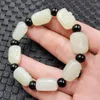 Strand Lohans Kopf Hetian mit weißen Jade -Armband Typ