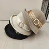 Berets 202404-2509165 Ins Chic Summer Japan Pearl Ring Button Ribbon Grass Grace Sunscreen Lady Bucket Cap Women Leisure Hat