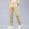 HighEnd Stretch Business Fashion Breathe Casual Pants Mens Spring and Summer Korean Version Slim Fit Cotton Trousers 240417